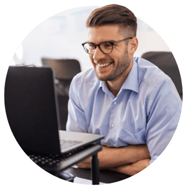 k-12 school administrator using PowerSchool software to identify cybersecurity threats on a laptop