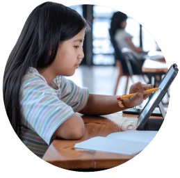 Middle school student using Schoology Learning on a tablet