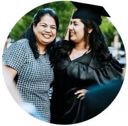 Mother and daughter celebrating daughter's high school graduation