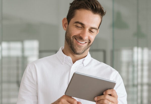 man using PowerBuddy on a tablet